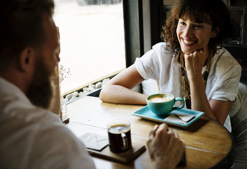 People hangout together at coffee shop rendez-vous